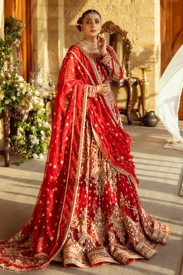 NAQSHI Firaaq apple-red bridal 4PC ensemble with round-neck net choli, fitted sleeves and heavily embellished hand‑adda appliqué, cut‑dana, crystals and stonework.
