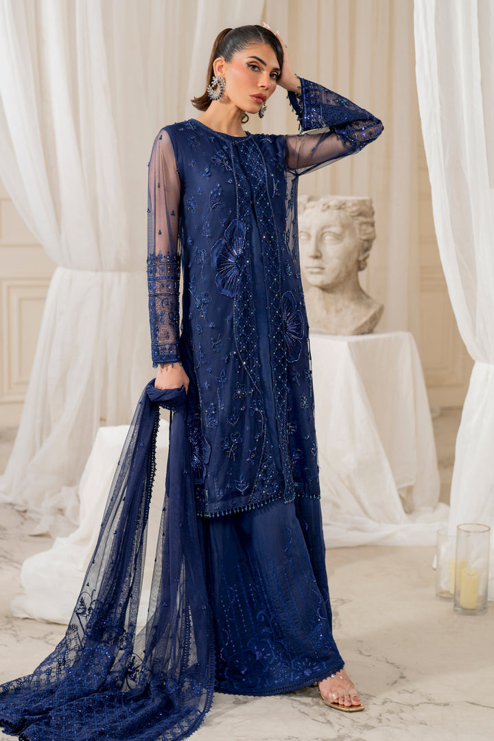 Zoom-in of naqshi nayal gown mid section revealing layered textured panel with crystal embroidery and botanical motif sprinkles.