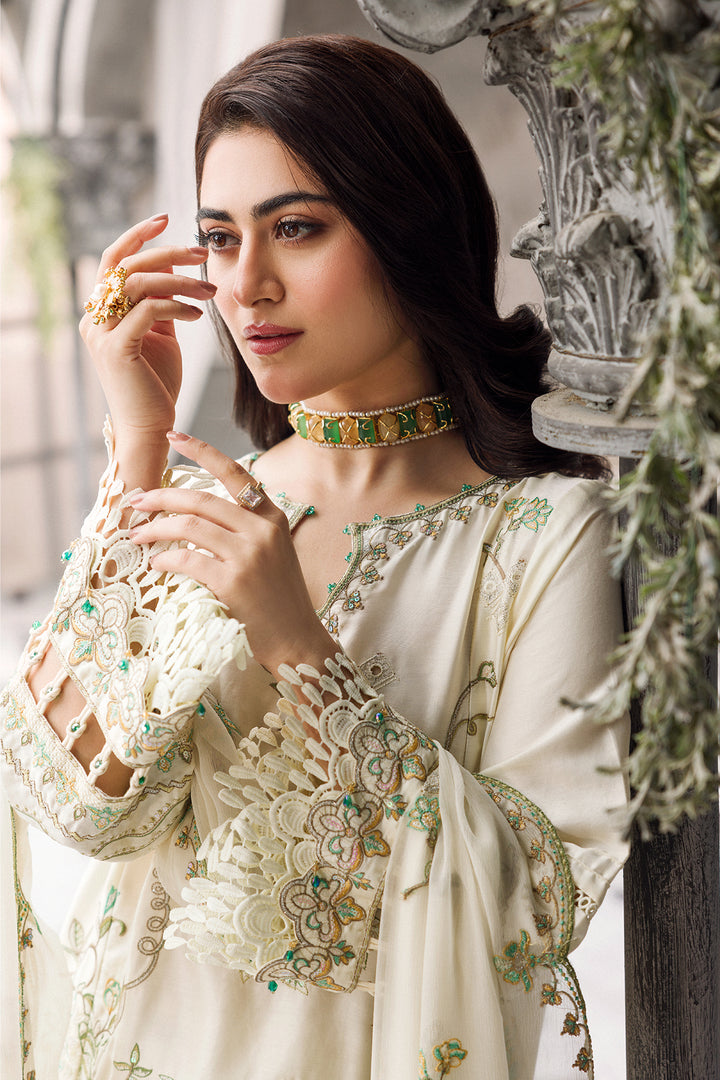 Close portrait showing dupatta scalloped edge embroidery and outfit detailing