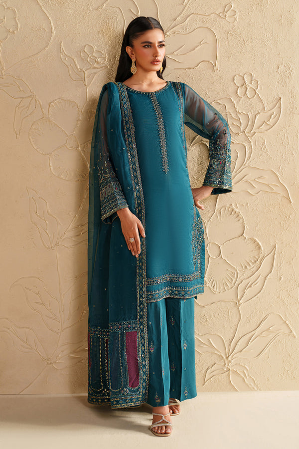 NAQSHI deep teal dress with fine embroidery and straight long cut, styled for elegant occasions