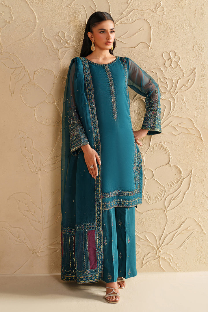 NAQSHI deep teal dress with fine embroidery and straight long cut, styled for elegant occasions