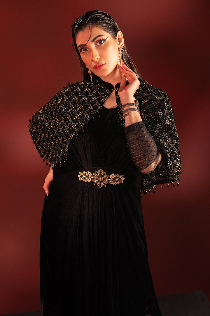 Front portrait of Ayna outfit focusing on neckline detailing and antique waist brooch, formal ready made evening dress.