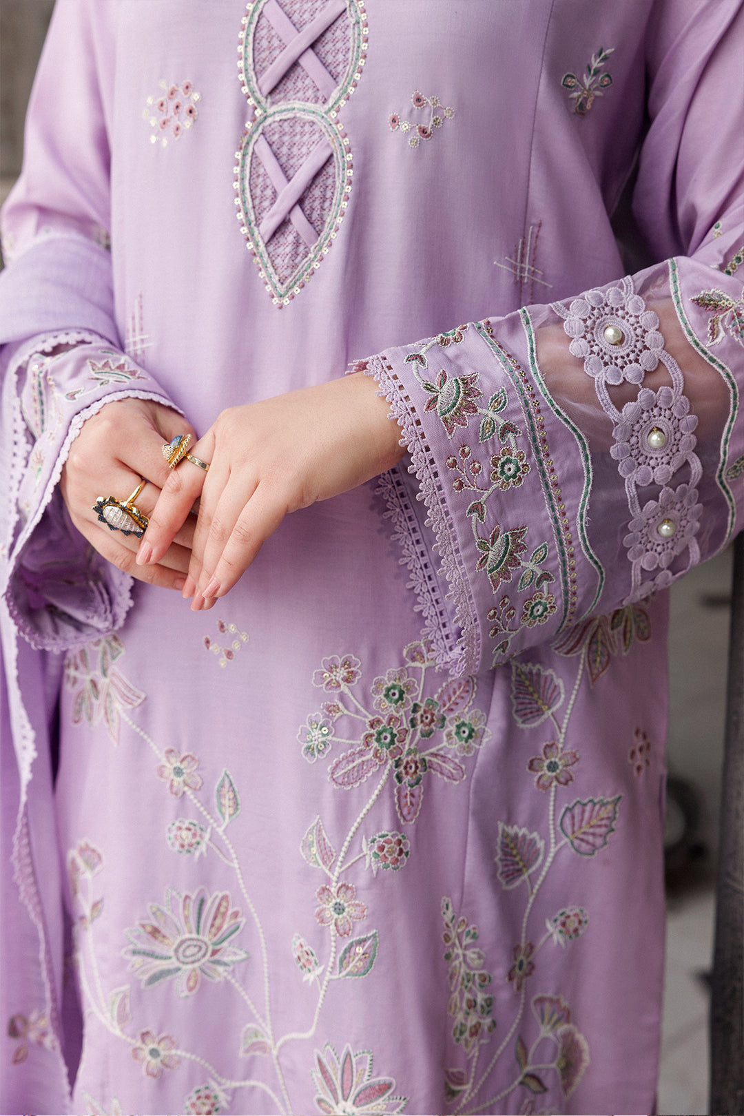 Close-up of NAQSHI Adah sleeve showing embroidery, sequin work, organza applique, and lace trim detail