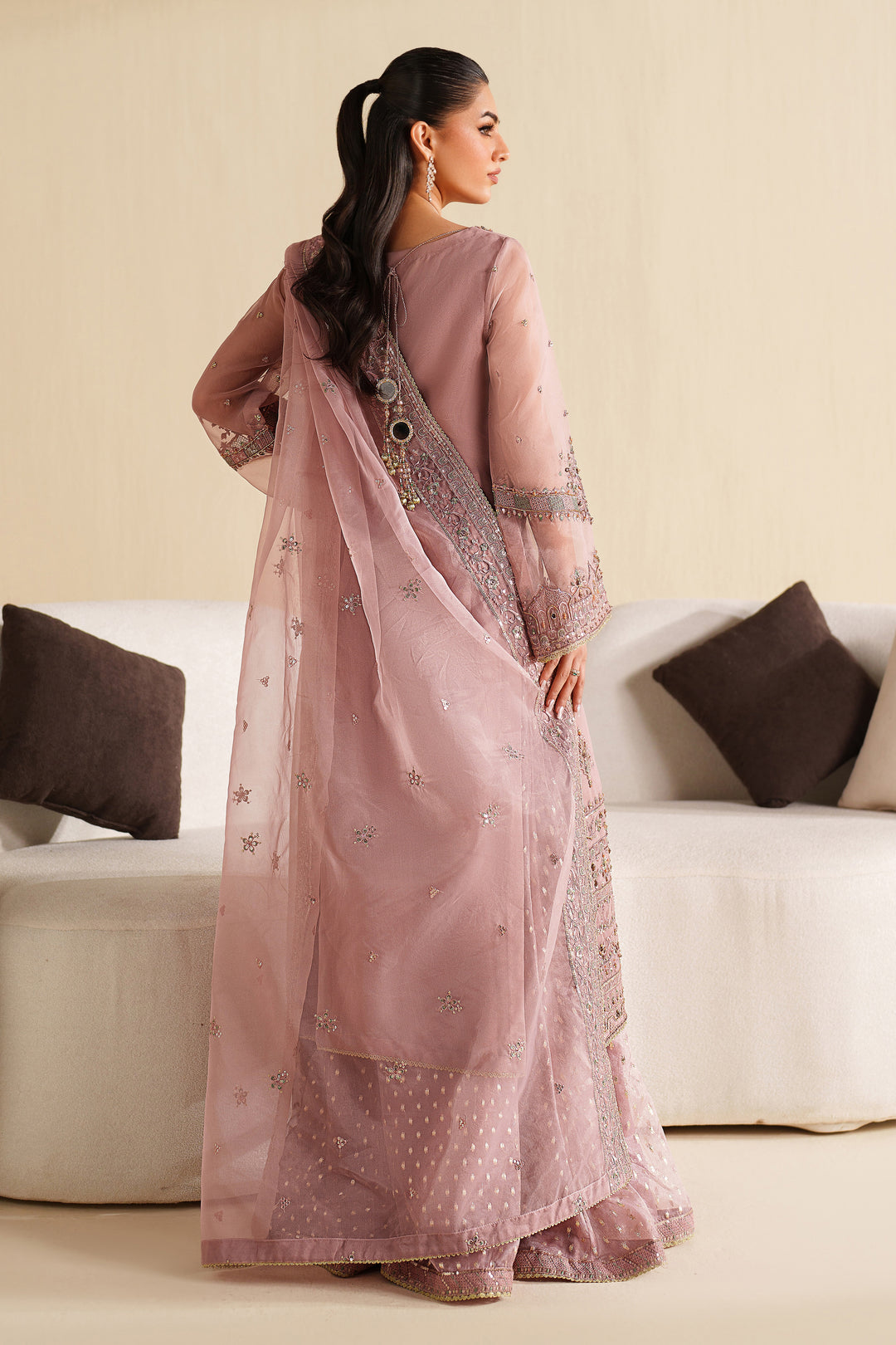 Back view of NAQSHI blush pink dress highlighting dupatta drape and graceful fall for special events
