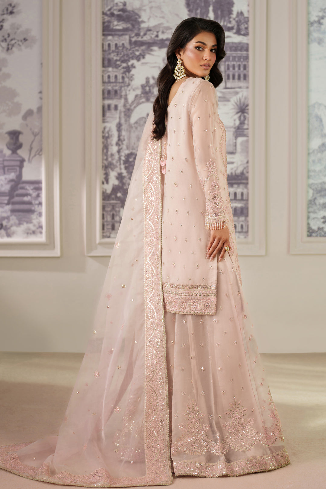 Zri by NAQSHI back view highlighting deep back neck with embroidered motif and elegant tassel detail