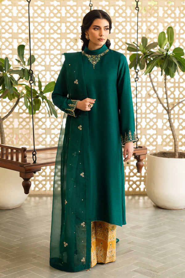 NAQSHI Zauq teal-green raw silk straight shirt with ban neckline richly adorned in hand‑adda techniques—kora, dabka, naqshi, sitara, cut dana, crystals & botanical embroidery; paired with mustard culottes.