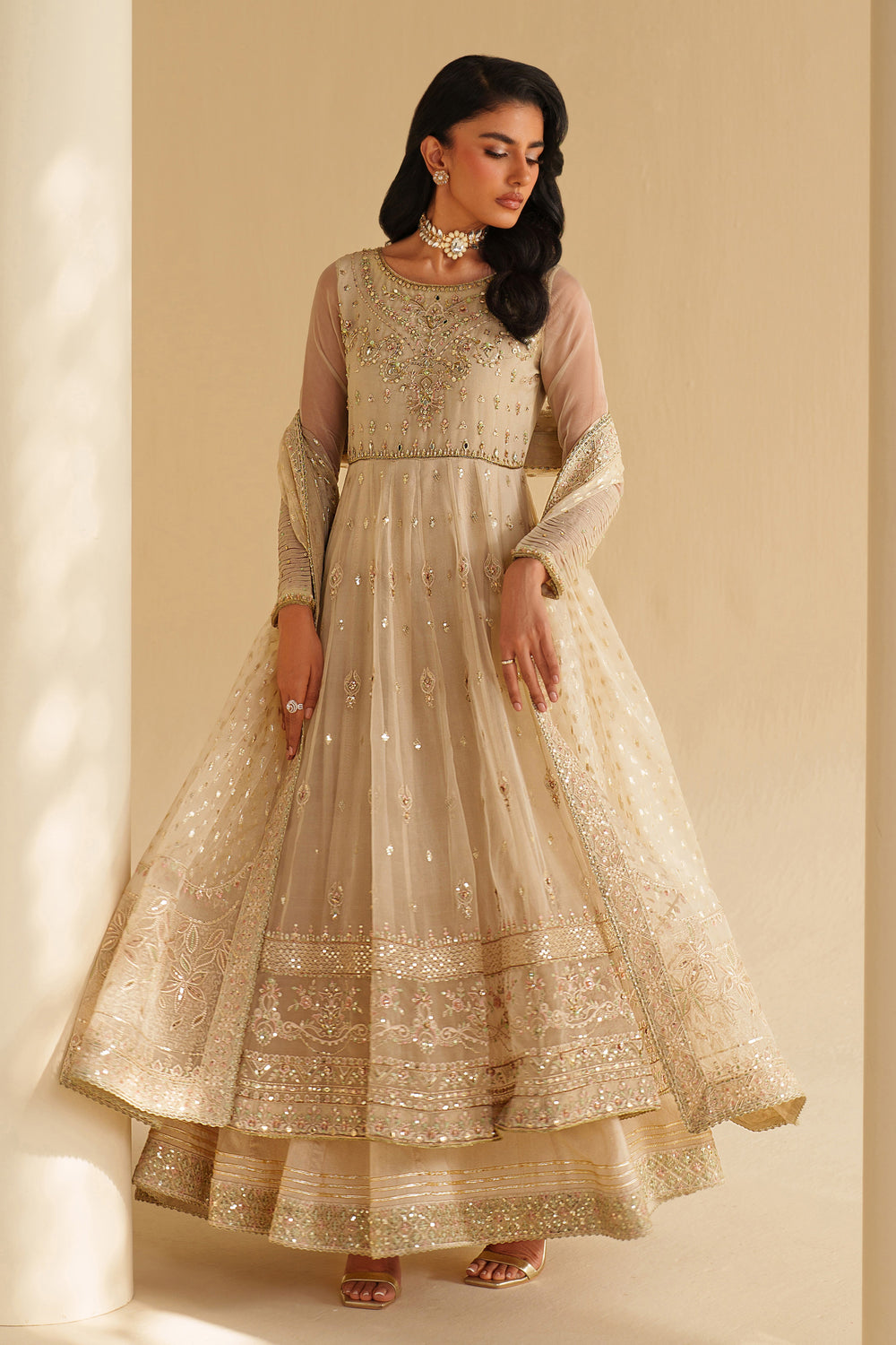Front view of NAQSHI Aroha off-white embroidered organza frock paired with straight raw-silk trousers and matching organza dupatta — semi-formal special event outfit