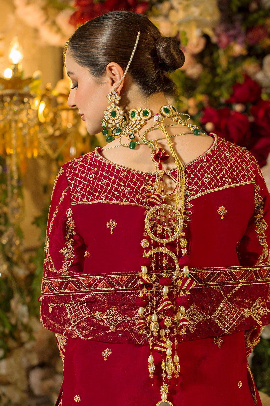 Close-up of Gehna shirt’s back displaying extravagant handmade hanging tassels, dense sitari embroidery and hand-adda work.
