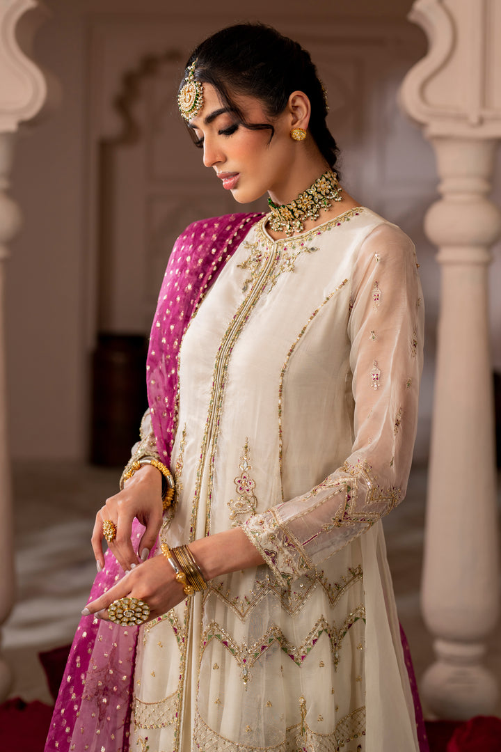 NAQSHI Abeeha outfit styled with magenta dupatta draped over shoulder, showing embroidery, sequin details, and contrast accents
