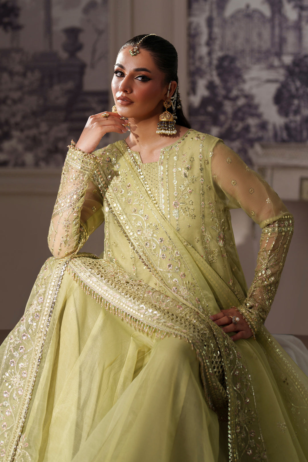 Nibaat by NAQSHI angled view showcasing broad neckline, center panel embroidery, and shimmering sequin spray