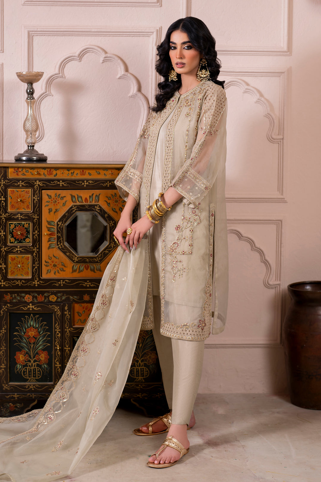 Detailed shot of Naqshi Arwa mid‑front gown panel featuring embroidered boring patterns and textured embroidery.