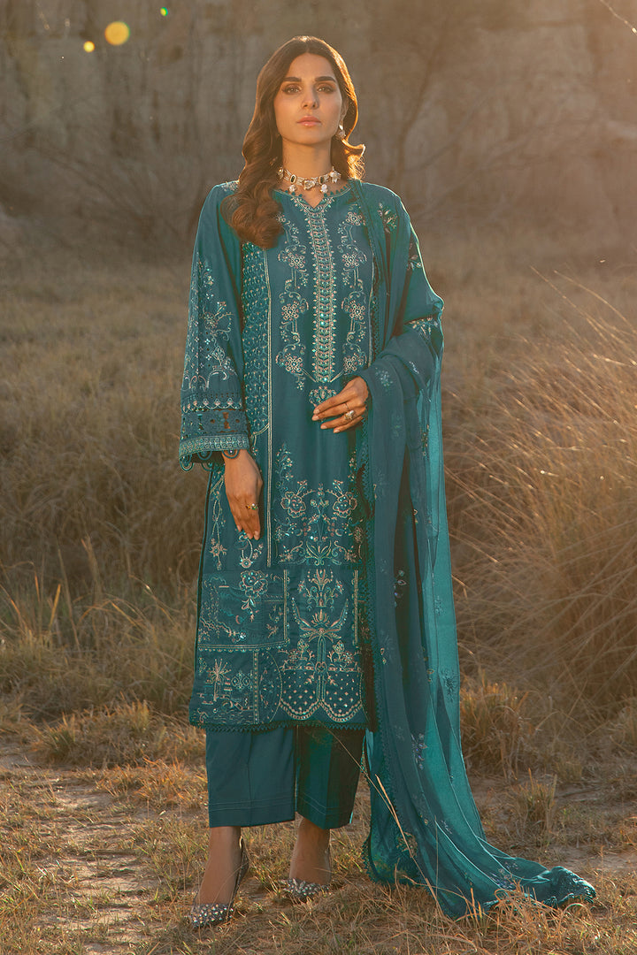 Walking pose of zinc ready to wear 3 piece suit with long shirt and straight trousers suitable for family functions