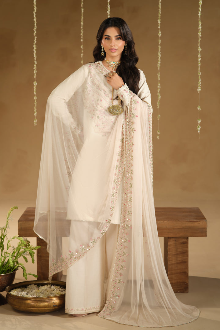 Full length look of Rafza ready to wear Eid outfit with airy embroidered net dupatta and modest straight shirt silhouette