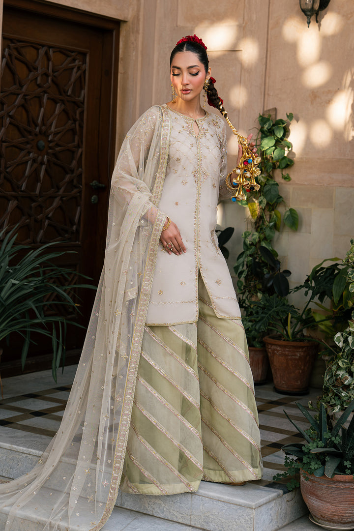 Saaz skin and pistachio organza 3 piece semi formal dress with embroidered shirt, flared trousers and net dupatta from NAQSHI Tabeer collection