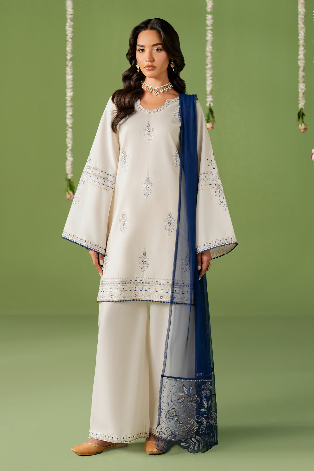 NAQSHI Kinza off-white ready-to-wear outfit with lawn straight shirt, cambric culotte trousers, and blue net dupatta