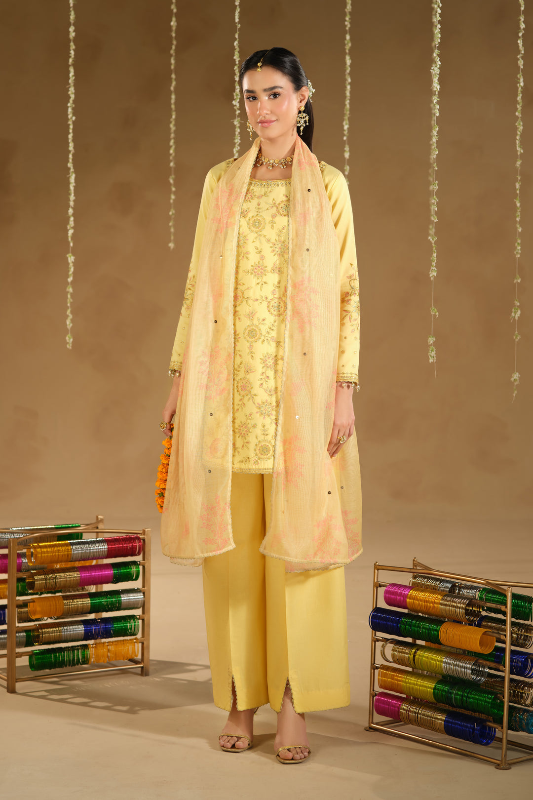 Full length standing pose of Aahal ready to wear outfit with light printed dupatta drape