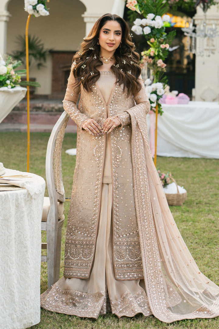 Ezaraa peach pink tissue lehenga gown with mirror work, shown from the front with net dupatta, formal wedding outfit by NAQSHI