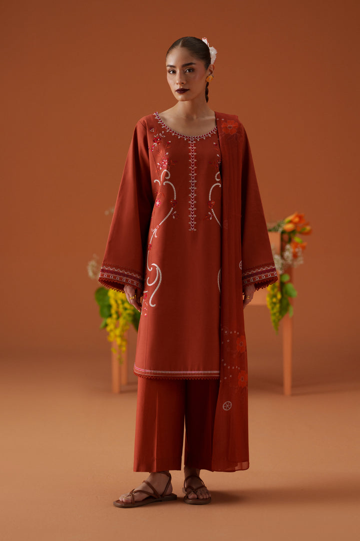 Ophelia rust 3-piece ready-to-wear outfit with embroidered lawn shirt, cambric culotte trouser, and printed crinkle chiffon dupatta.