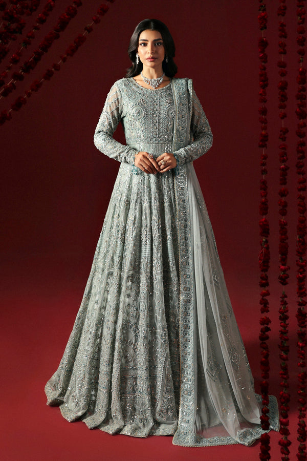 Satayesh in aqua makes a statement with sequin-embroidered bodice, structured frock & flowing panels—pure formal elegance.

