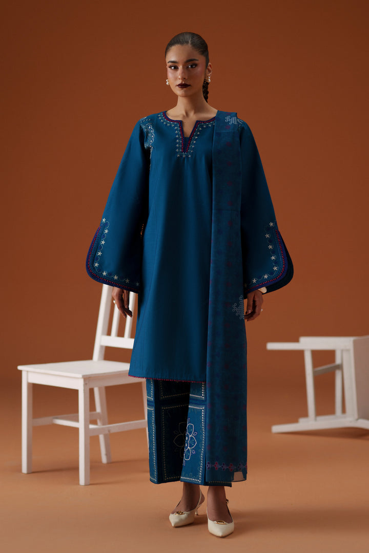 Juni teal 3-piece ready-to-wear outfit with embroidered lawn shirt, cambric culotte trouser, and printed crinkle chiffon dupatta.