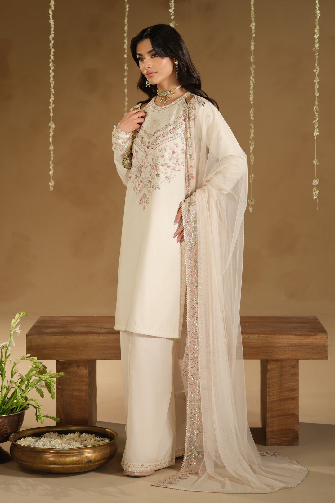 Side view of Rafza Eid dress showing straight cut Pima lawn shirt, wide culotte trousers and lightweight net dupatta for daytime gatherings