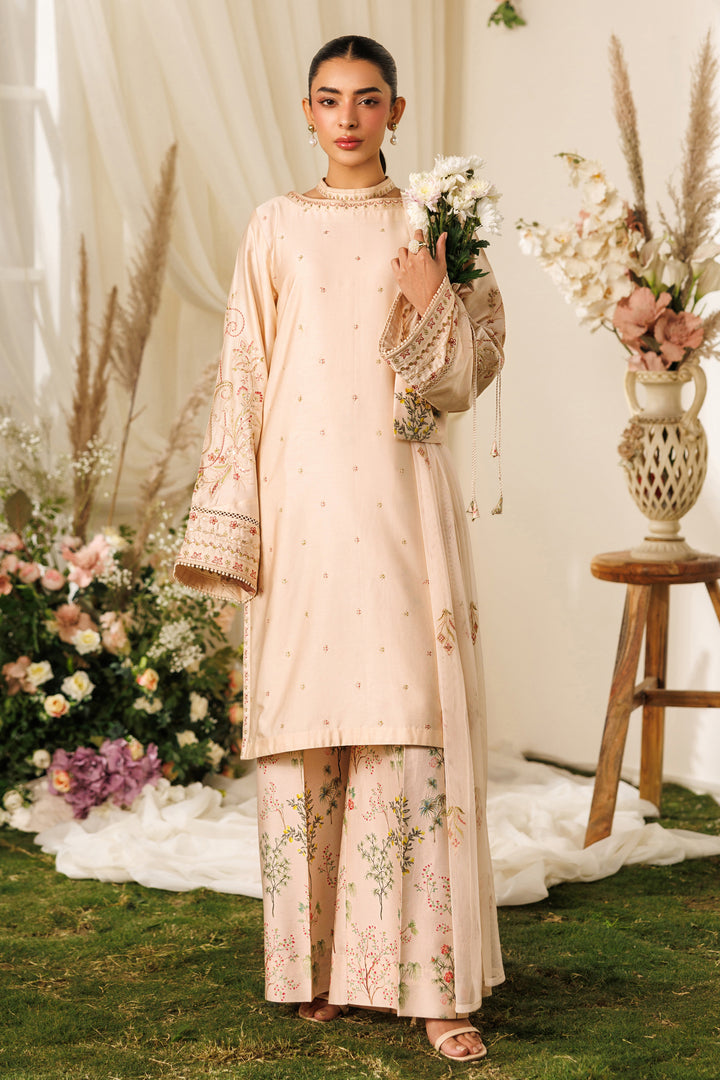 Full front standing view of NAQSHI Rayla outfit showing beige cotton satin shirt and printed culotte trousers