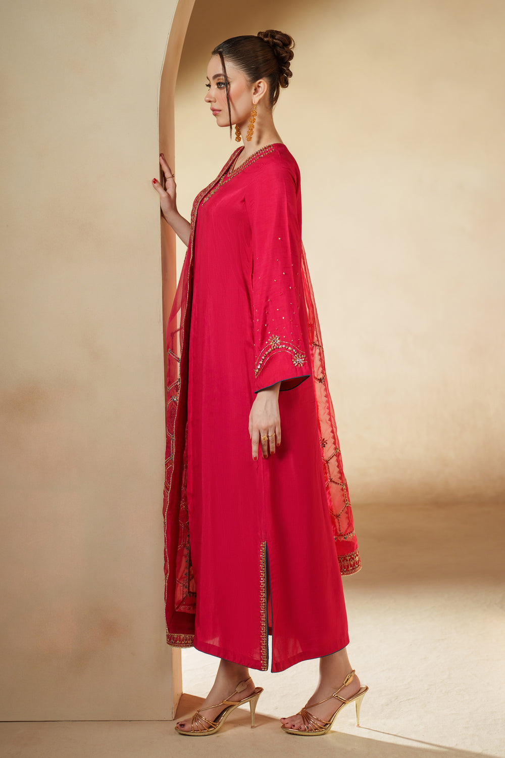 Back view of Sophia shocking pink luxury pret raw silk formal outfit with straight trousers