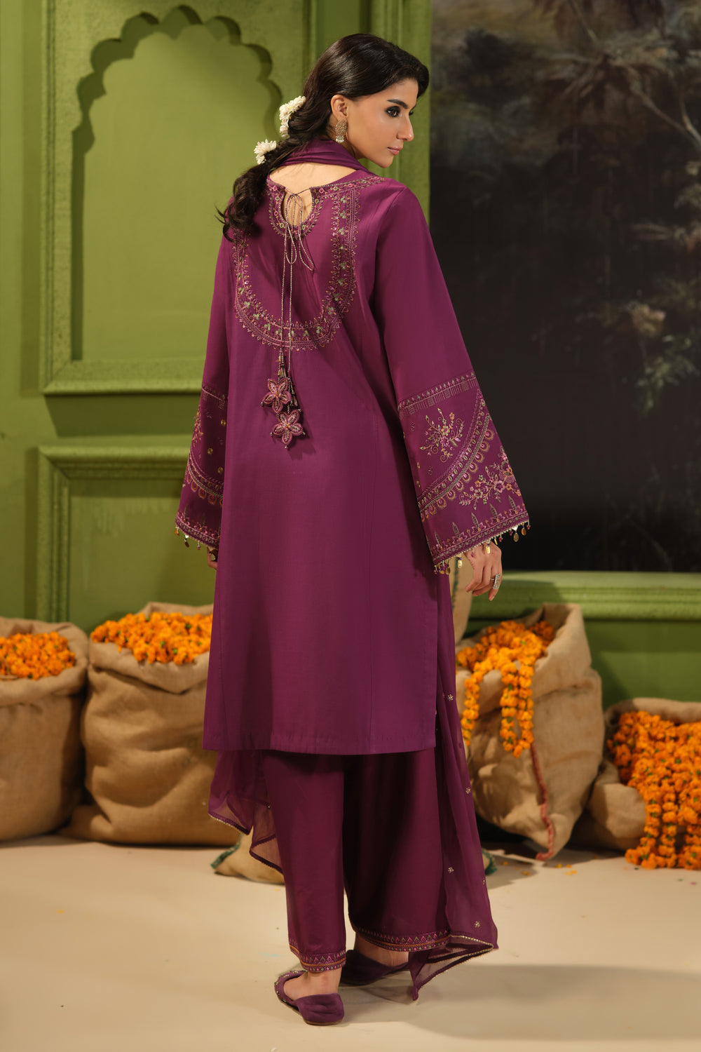 Back view of NAQSHI Huram plum Pima lawn embroidered shirt with cambric culotte trousers and crinkle dupatta