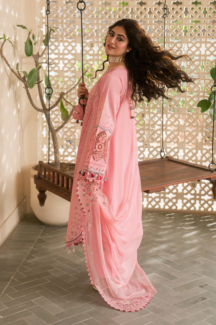 Side view of NAQSHI Kashmeera soft pink embroidered lawn outfit showcasing flowy silhouette and lightweight crinkle dupatta for summer wear