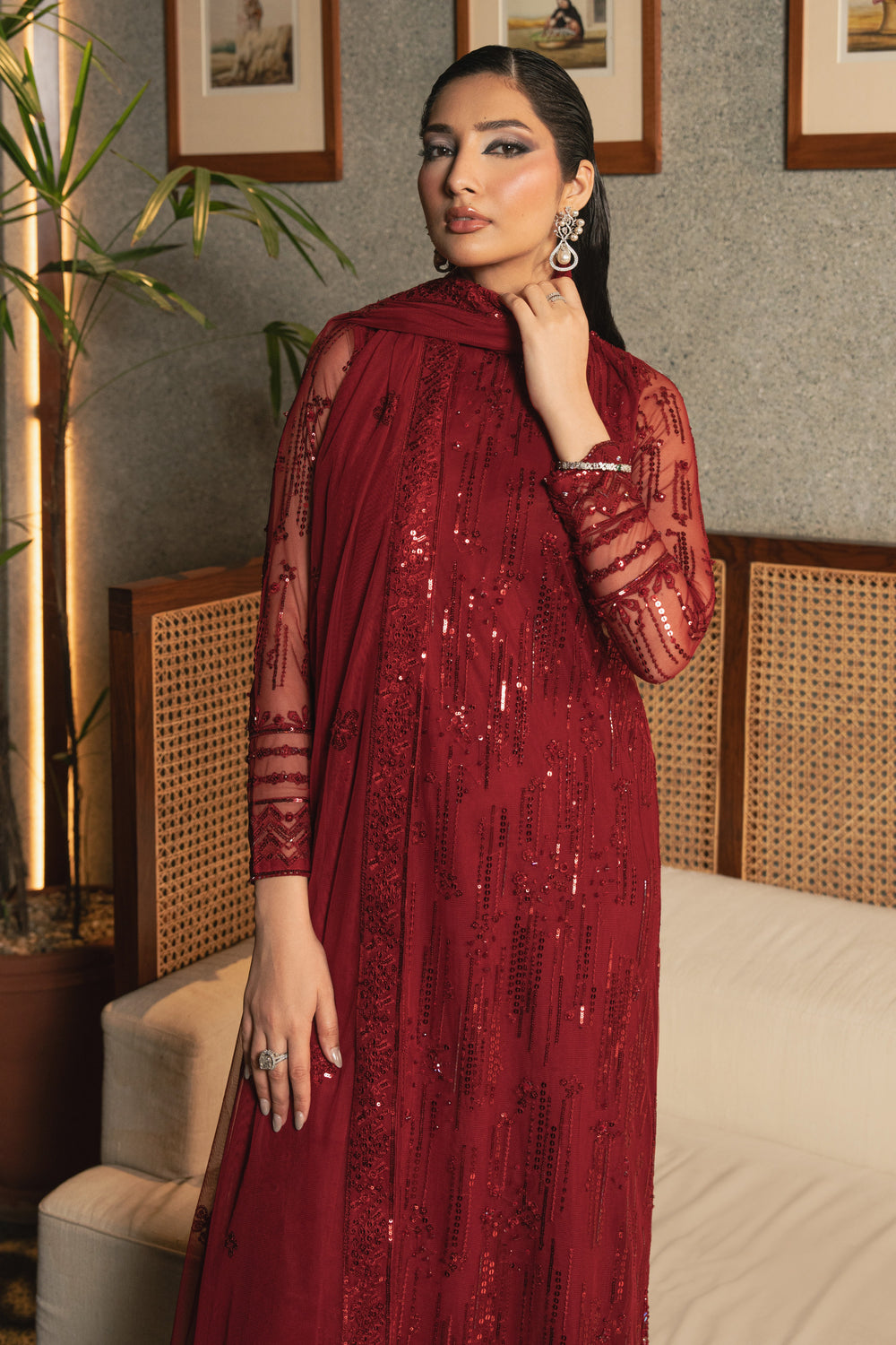 Full front view of NAQSHI Valentina rose red net outfit showing high-neck shirt, all-over embroidery, sequins, adda work, and straight trousers.