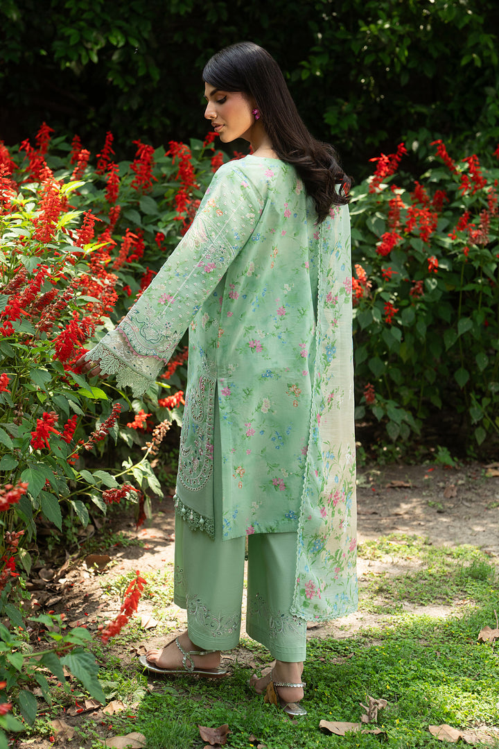 Back view of Menesa aqua green lawn shirt with loose fit, soft embroidery and airy sleeves paired with culotte cambric trouser