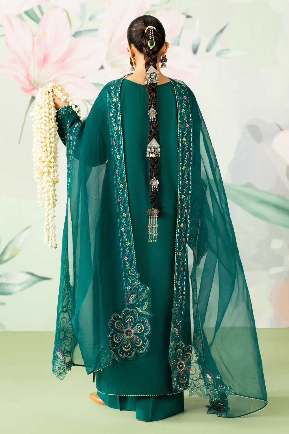Side view of NAQSHI Ankita olive green outfit showing detailed lace sleeves and embroidered pearl neckline