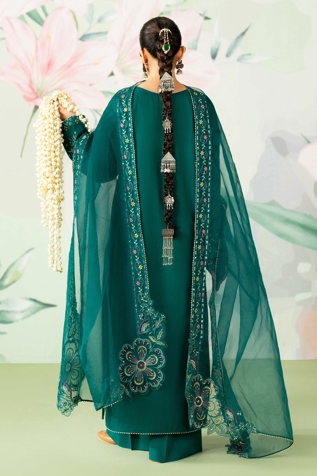 Side view of NAQSHI Ankita olive green outfit showing detailed lace sleeves and embroidered pearl neckline