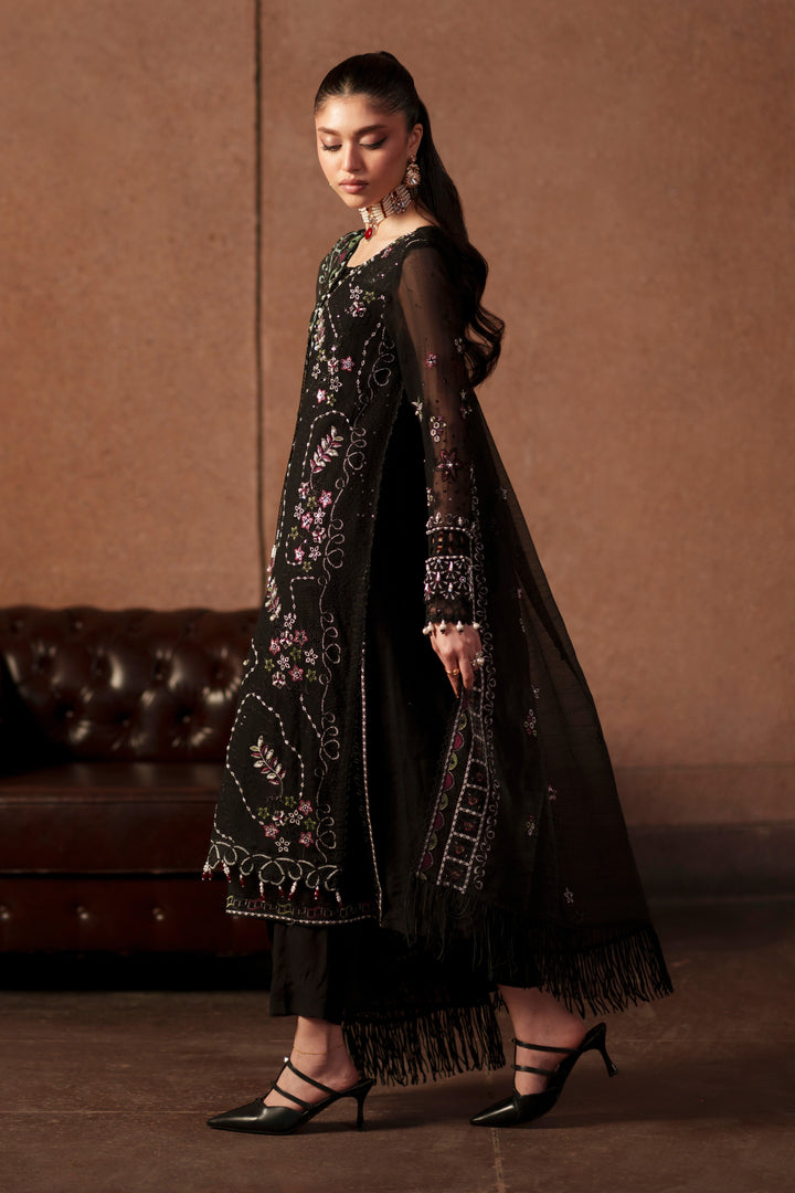 Side view of Zeya black embroidered khadi net dress featuring flowing silhouette, intricate embroidery and elegant cotton organza dupatta