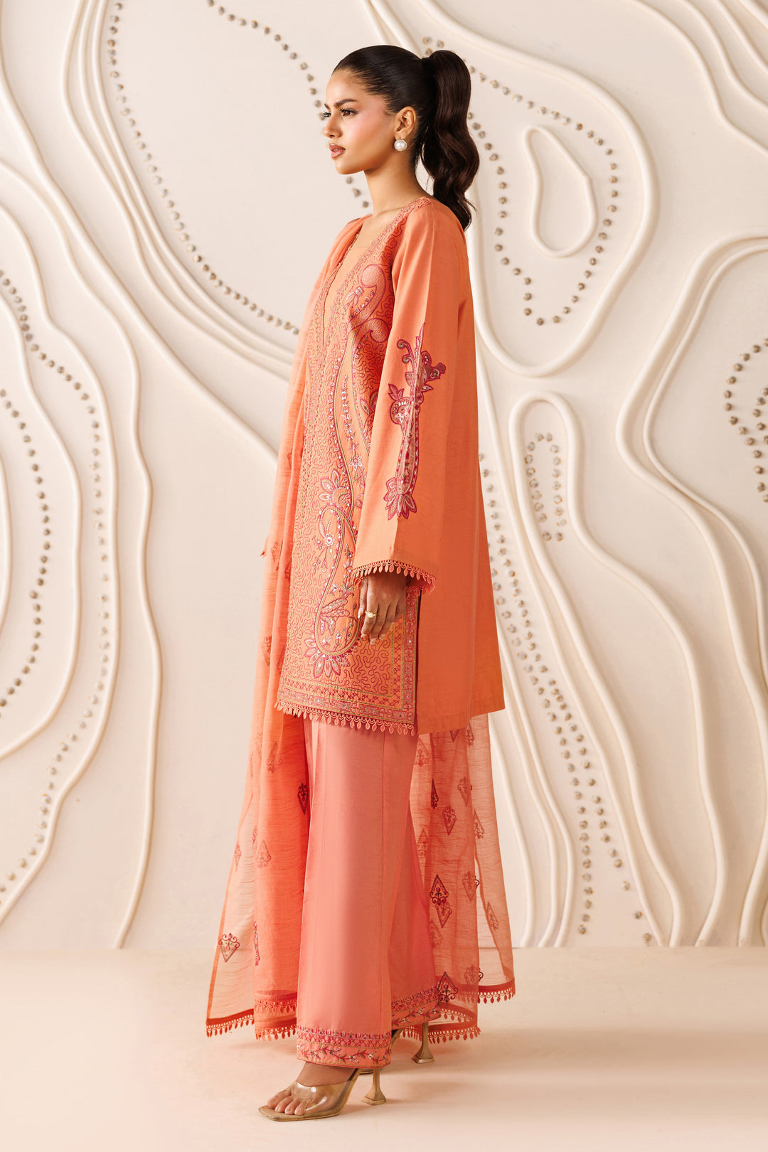 Side angle of NAQSHI Flaira outfit highlighting 12-panel cambric shirt, relaxed culotte fit, and clean silhouette