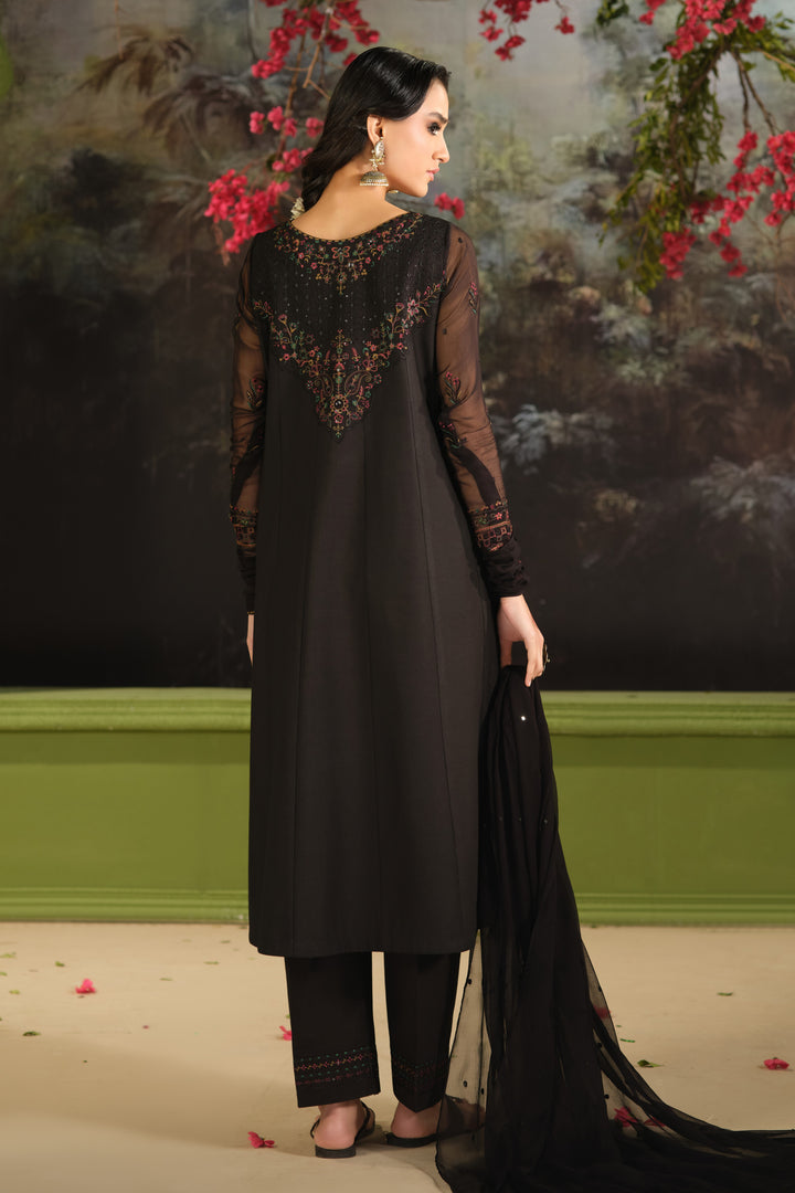 back view of NAQSHI Bindiya black Pima lawn long panel shirt with cambric culotte trousers and flowing crinkle dupatta