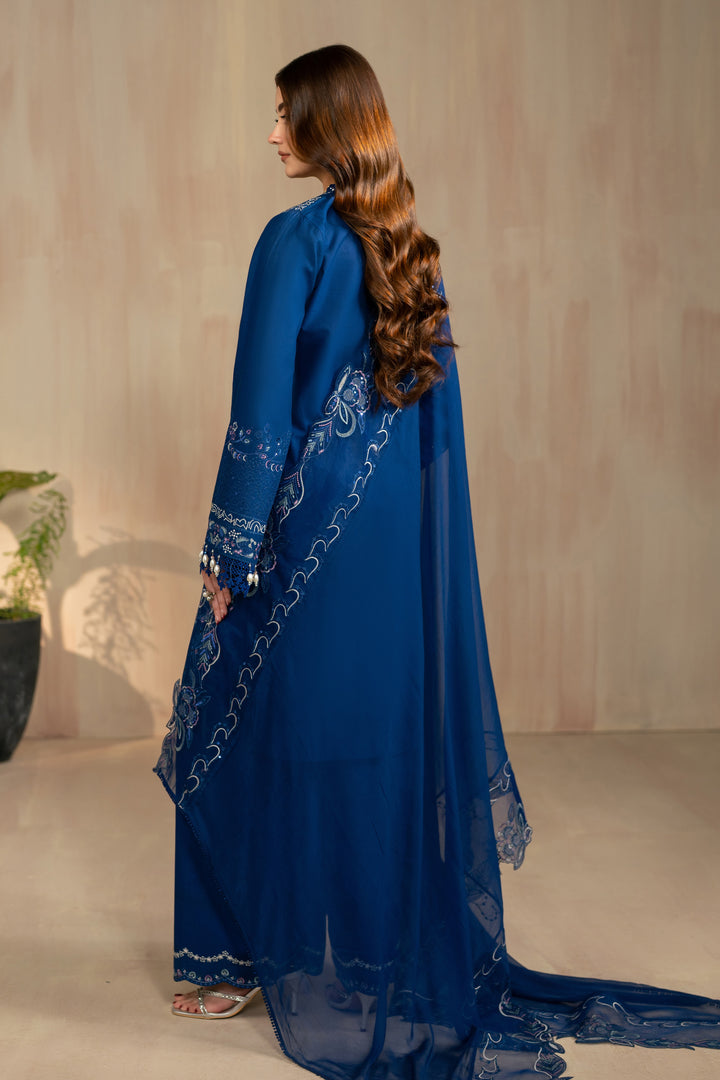 Back view of Atarah outfit showing flowing crinkle organza dupatta drape and straight shirt length, modest stitched summer gathering dress.