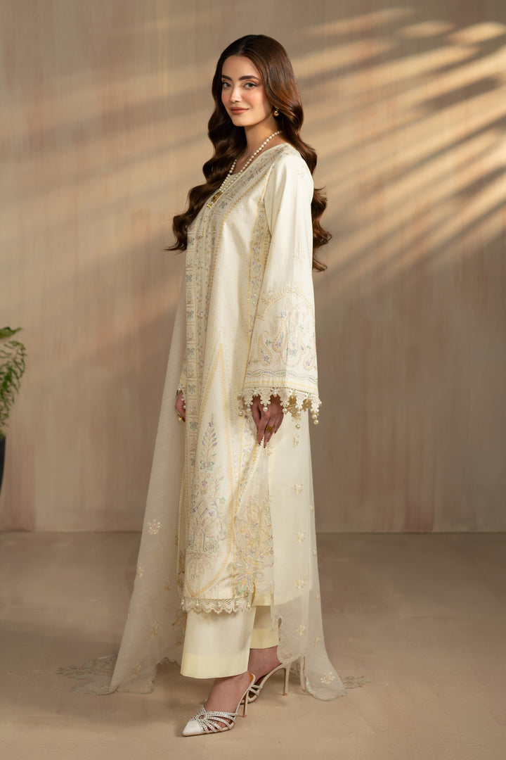 Side view of Ashnoor outfit showing modest straight silhouette and soft organza dupatta fall, stitched summer eastern wear.