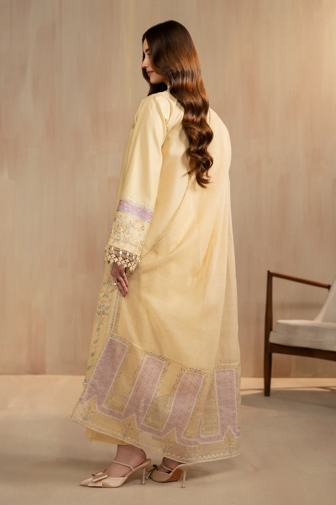 Back view of Nijah dress with soft cotton organza dupatta drape and long shirt length, stitched summer gathering attire.
