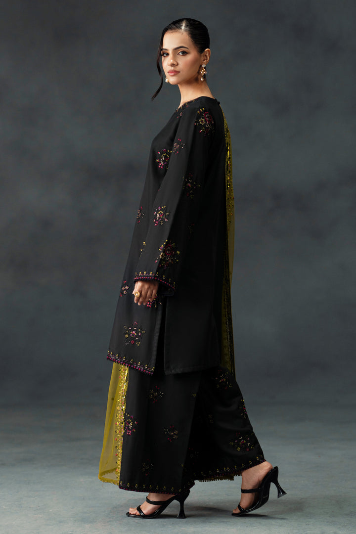 Madiha by NAQSHI angled view showing embroidery on shirt front and contrast olive panels