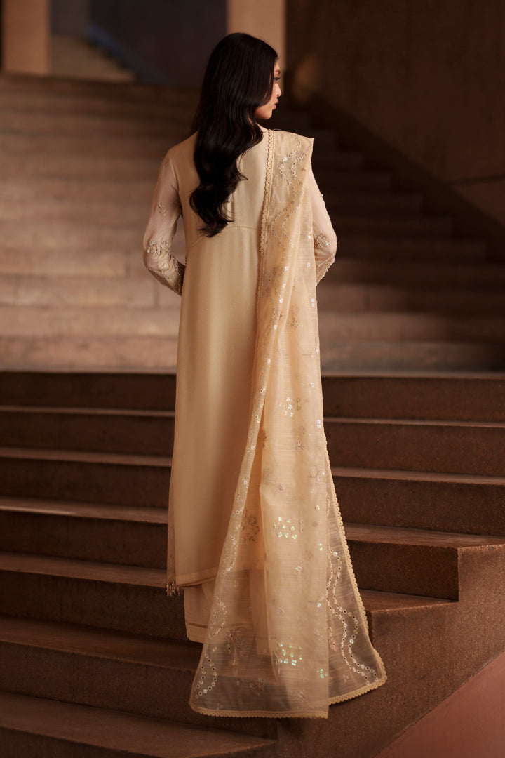 Back view of NAQSHI Igor vintage cream luxury pret outfit showcasing long khadi net shirt, graceful drape and embroidered dupatta styling