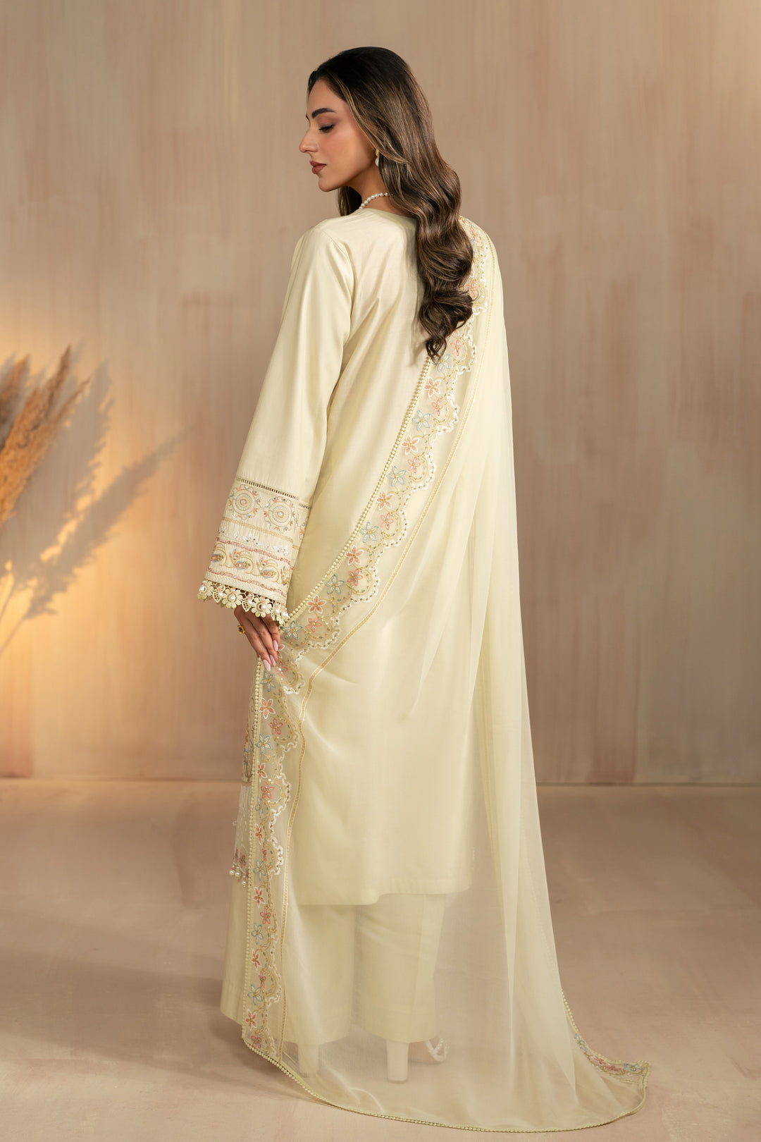 Back view of Nerissa dress highlighting breathable lawn fabric and relaxed culotte trousers, comfortable ready made gathering wear.