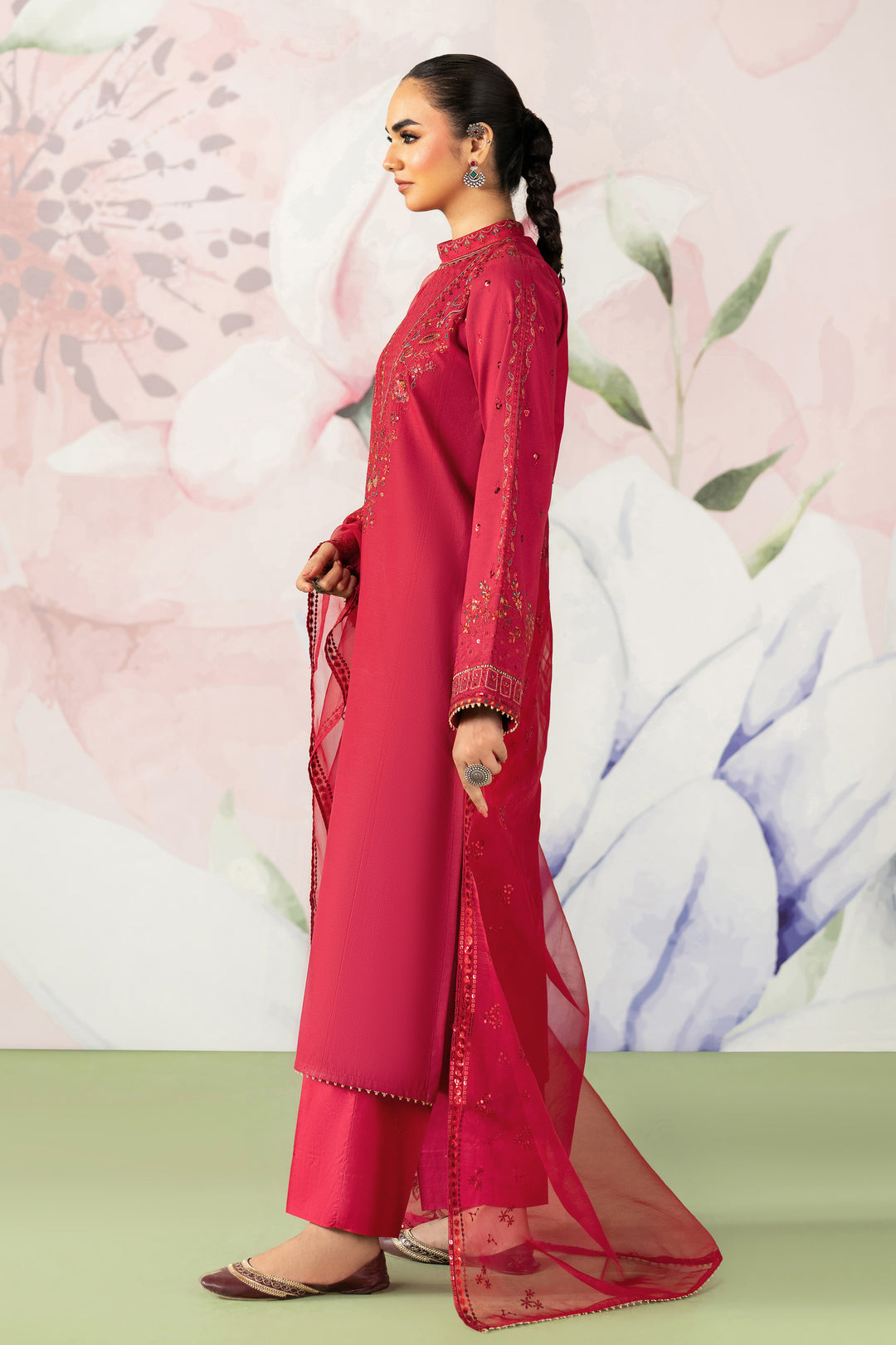 Side standing view showing red straight cut shirt with neat trouser fit and embroidered dupatta semi formal dress