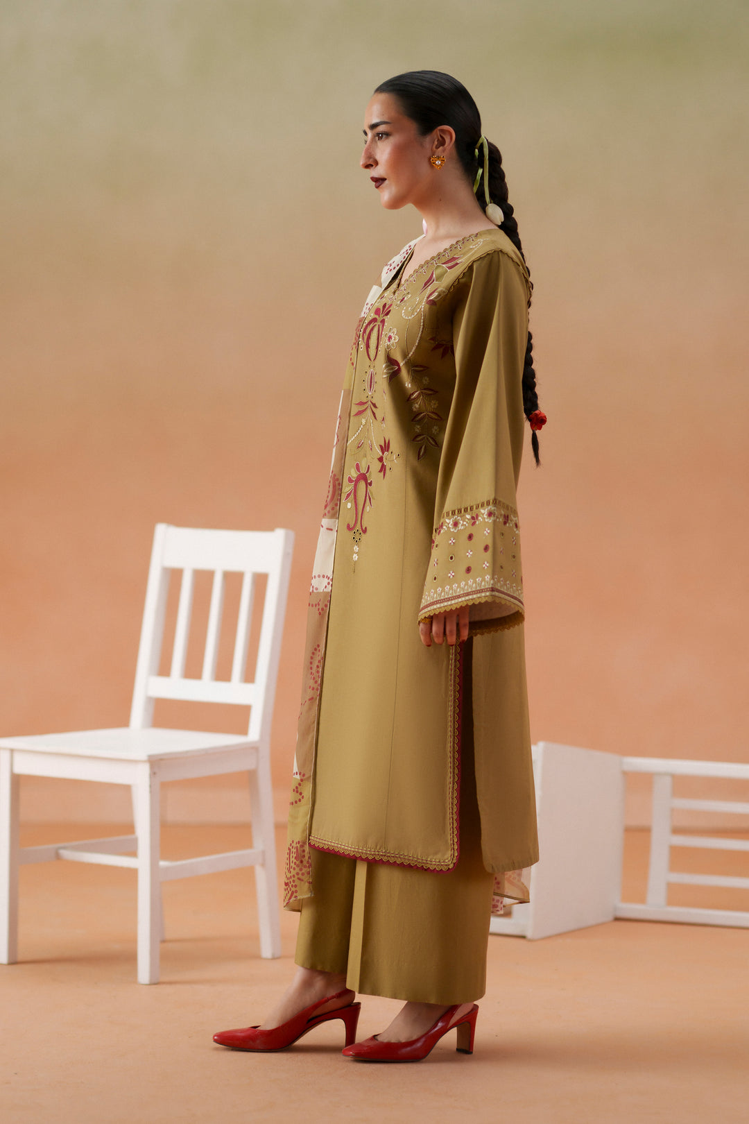 Side view of Lona olive beige ready-to-wear dress showing long embroidered lawn shirt, culotte trouser, and flowing printed dupatta.