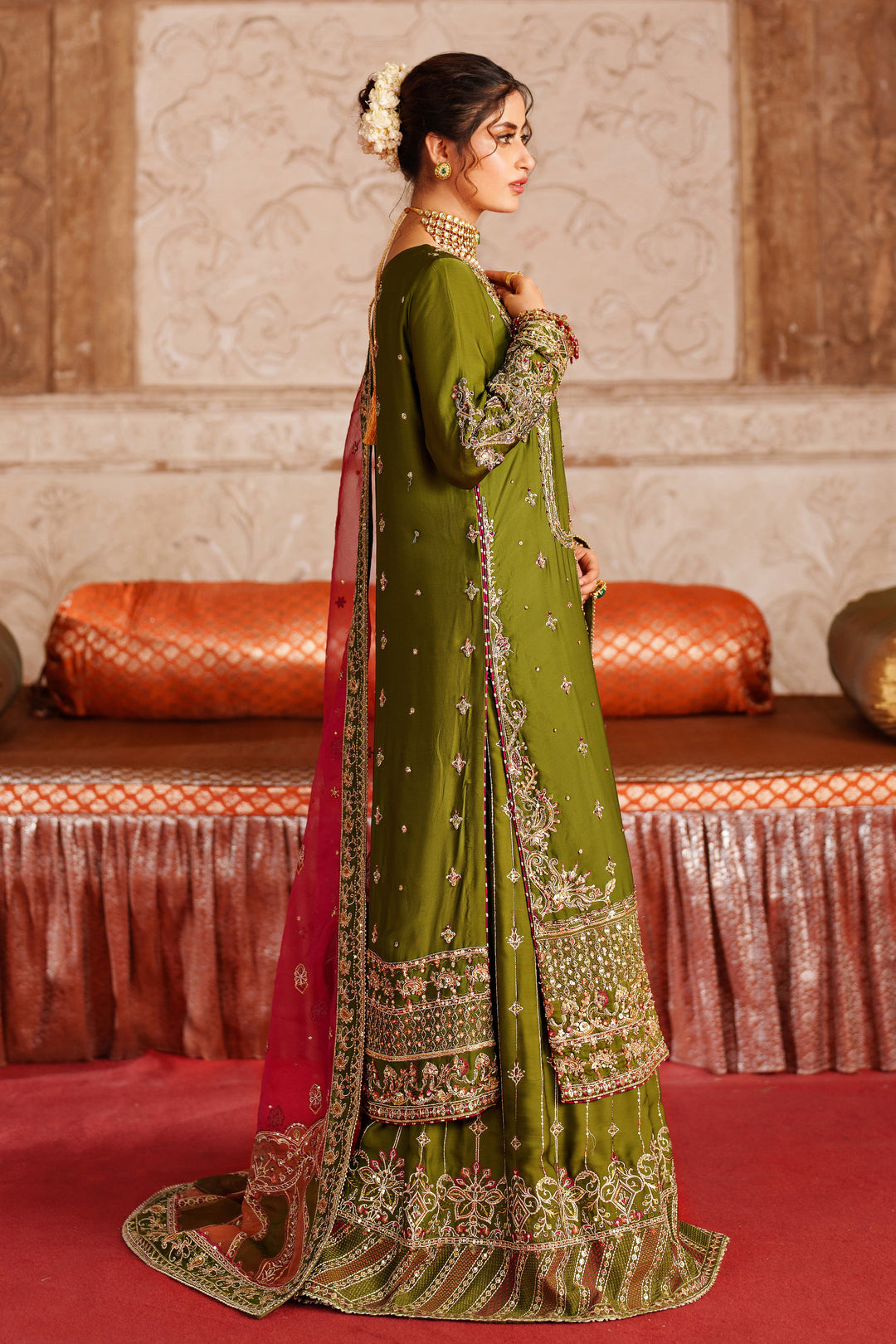 Side view of NAQSHI Anadil embroidered olive green event outfit with embellished bodice and coordinated wide leg pants for formal celebrations.