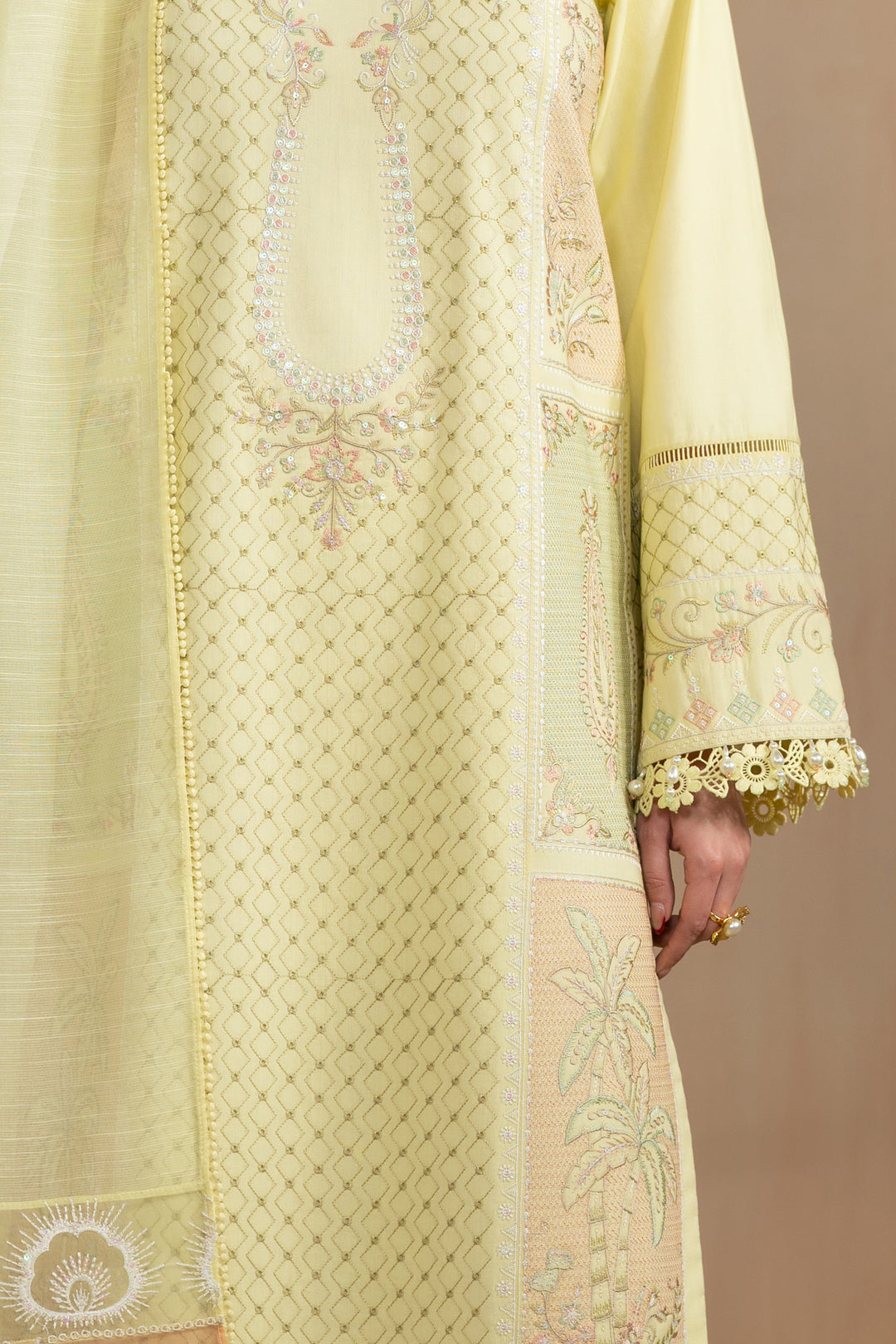 Front detail close up of Akasha shirt embroidery and neckline pattern, neat vertical thread work summer ready outfit.