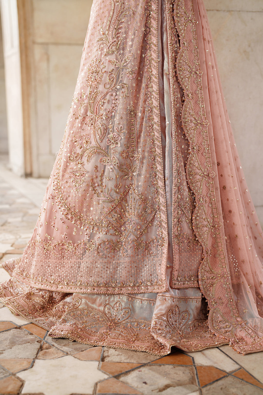 Close detail of NAQSHI Mareeha embroidered flare skirt in soft pink ready-to-wear dress for formal occasion wear.