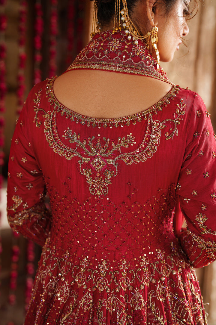 Close up embroidery and embellishment detail on NAQSHI Zeban red bridal lehenga blouse for formal bridal event wear.