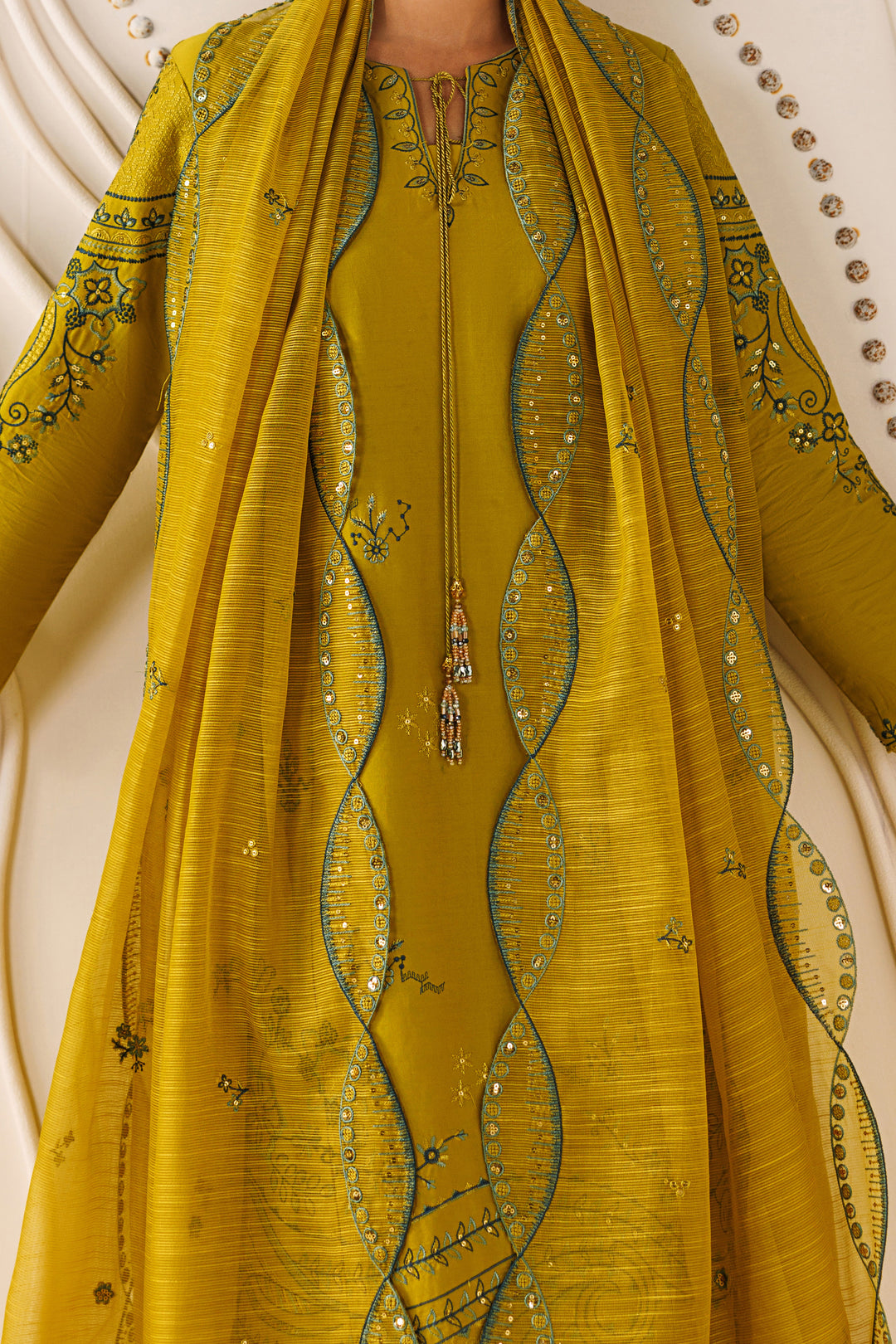 Close-up of NAQSHI Evara cotton organza dupatta showing embroidery, sequence work, and soft flowing texture