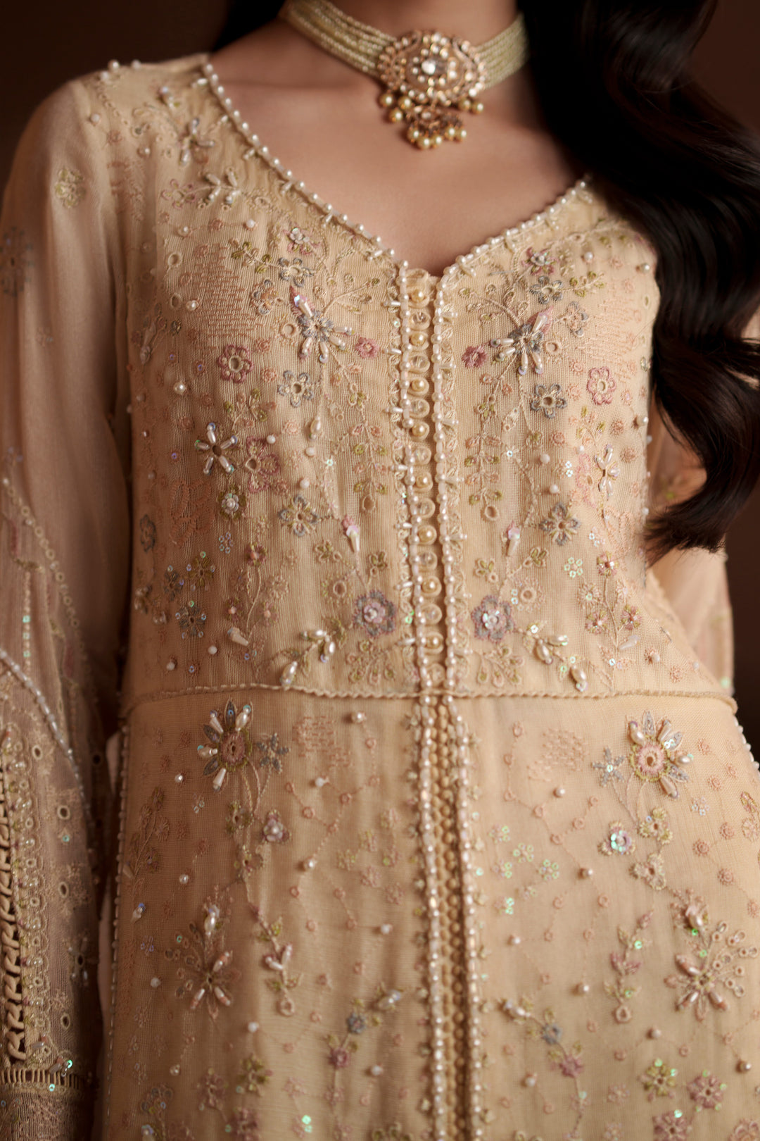 Close-up of Igor vintage cream embroidered khadi net shirt highlighting intricate embroidery, loop button detailing and refined neckline design